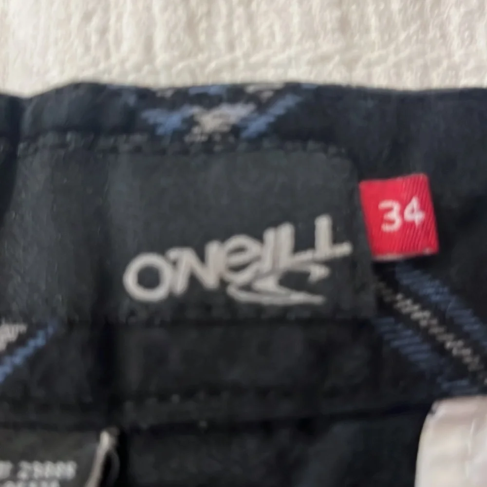 O’Neill vintage 90s plaid shorts.